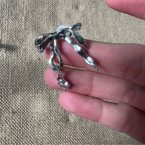 Silver bow metallic dangle stud earrings large lightweight abstract art 3d cute